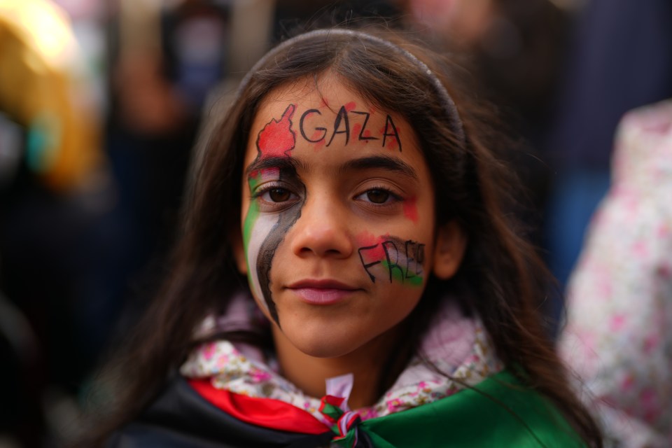 A young supporter of Palestine attending the rally in the capital