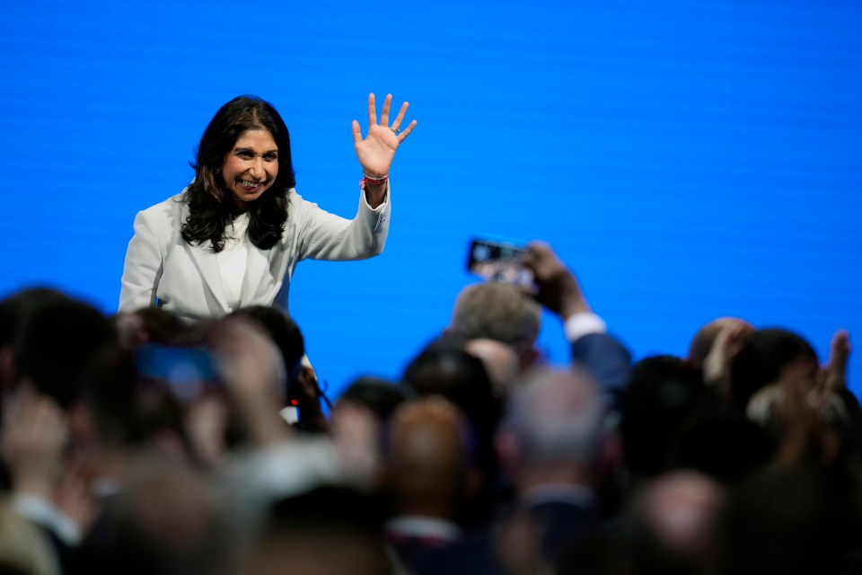 Tory activists cheer Ms Braverman following her address in Manchester