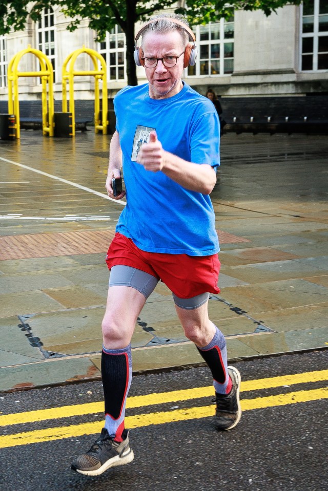 Michael Gove gives a thumbs-up on a run before his conference speech