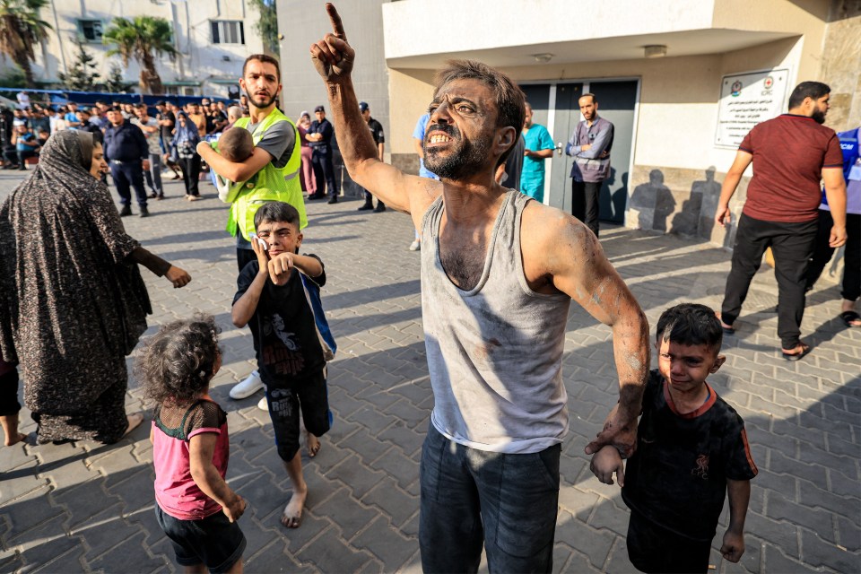 A wounded family in Gaza following an air strike