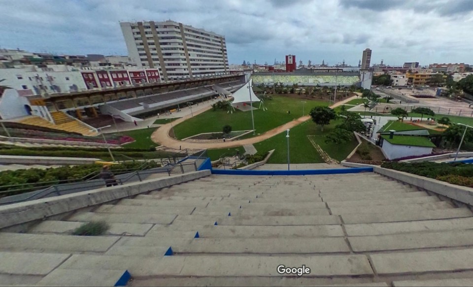 Three of the stadium's old stands still remain with tributes to Las Palmas littered around the park