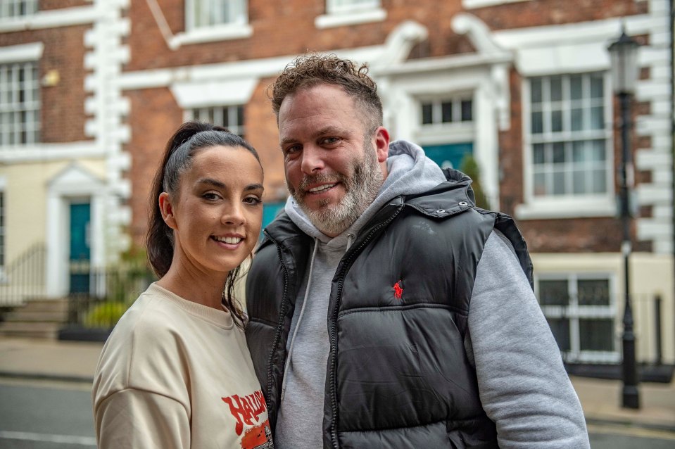 Local swimming teacher Jodie Minion (pictured with partner Mark) believes in ghosts