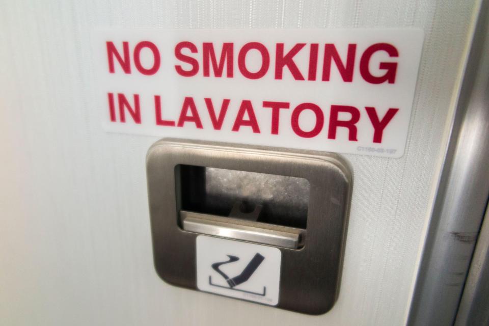 The doors inside plane bathrooms still have ashtrays built into them