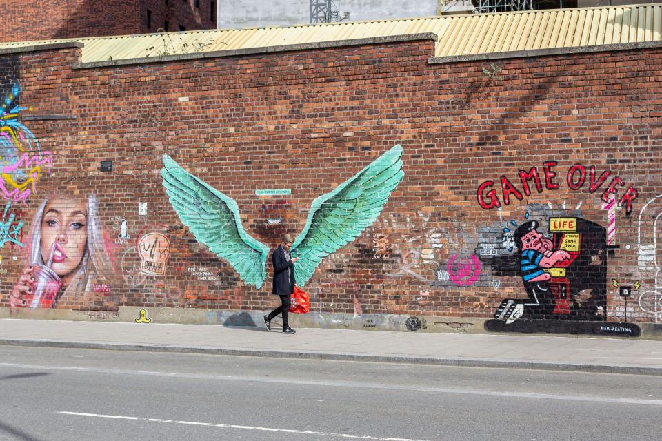 Tourists can try and spot all of the street art, including the famous Liverpool wings