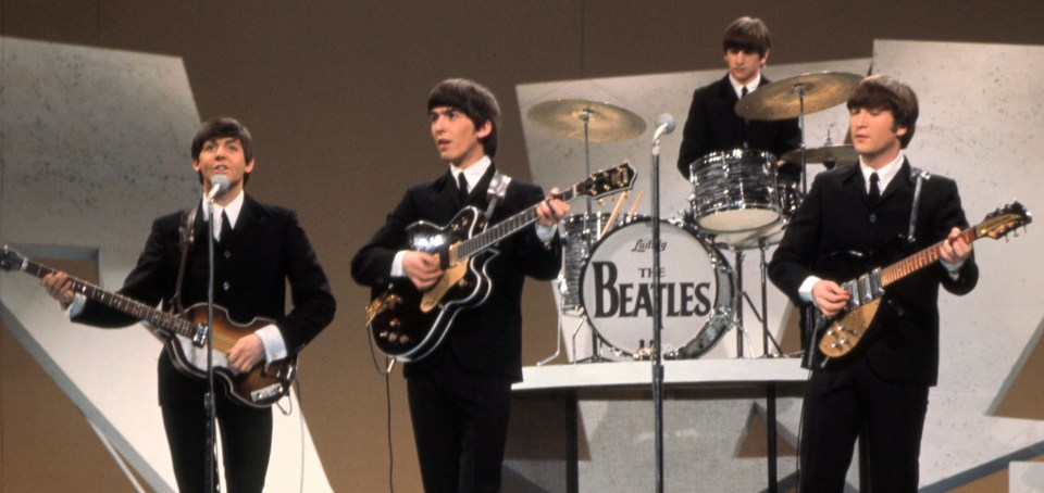 The group performing live on The Ed Sullivan Show in America in February 1964