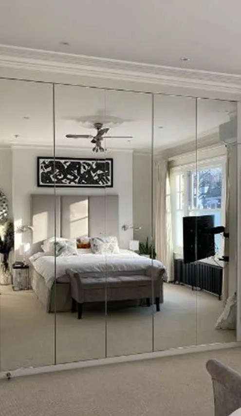 The spacious bedroom features a full-length mirrored wardrobe - perfect for checking out those sparkly outfits