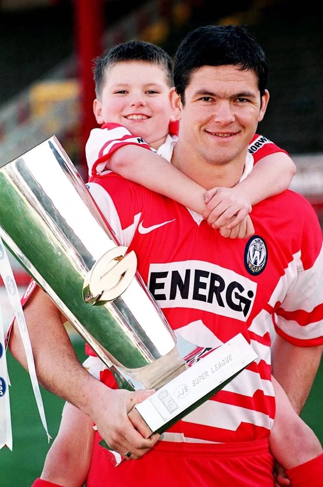 As a kid, Owen Farrell (pictured on his dad's shoulders) could have chosen to play for Man Utd