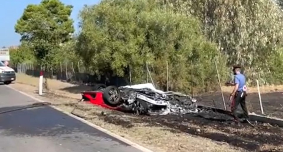 The burnt out Ferrari after the horror crash