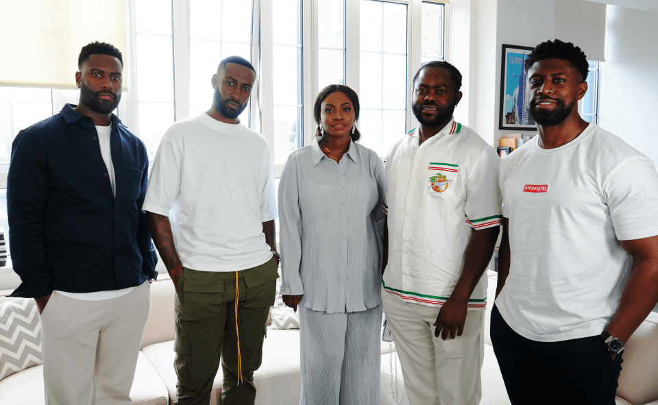 Debbie Ajayi O, pictured centre with her husband, was shocked when she won £500,000 to buy her dream house