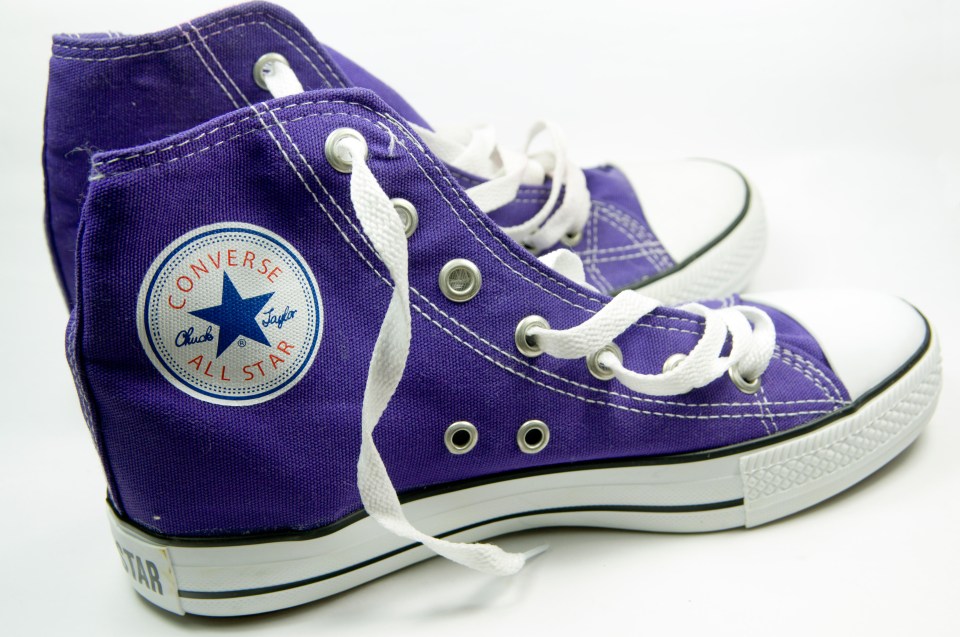 EE9GWW Pair of fake Converse Trainers, from Turkey.