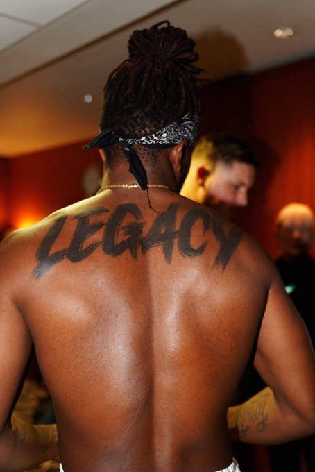 KSI's fourth tattoo is scribbled across his back