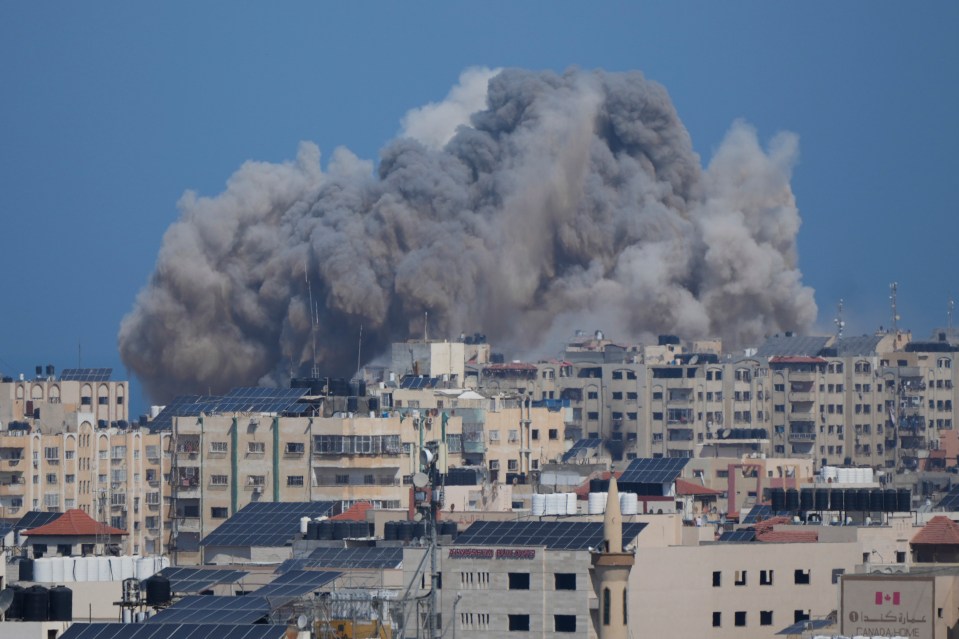 Smoke rises following an Israeli airstrike in Gaza City on Thursday