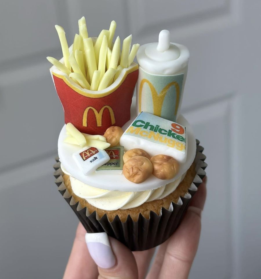 PIC FROM KennedyNews/AshleysCakes (PIC SHOWS: ONE OF ASHLEY CALDER'S BAKED GOODS THE MCDONALD'S CHICKEN NUGGET CUPCAKE) A baker who worked alongside Heston Blumenthal is flogging mad-cap cupcakes of the most mundane supermarket items ever such as Tesco bacon rashers and M&S PRAWNS - but they can cost MORE than your weekly shop. Ashley Calder, from Edinburgh, previously worked with the bonkers celeb chef at his prestigious three-Michelin-star restaurant The Fat Duck but says she is completely self-taught when it comes to baking. The 38-year-old began creating the wacky bakes after finding miniature food was 'going viral' online and was soon immortalising people's grocery shops in fondant, which can take up to an hour for each one. DISCLAIMER: While Kennedy News and Media uses its best endeavours to establish the copyright and authenticity of all pictures supplied, it accepts no liability for any damage, loss or legal action caused by the use of images supplied and the publication of images is solely at your discretion. SEE KENNEDY NEWS COPY - 0161 697 4266