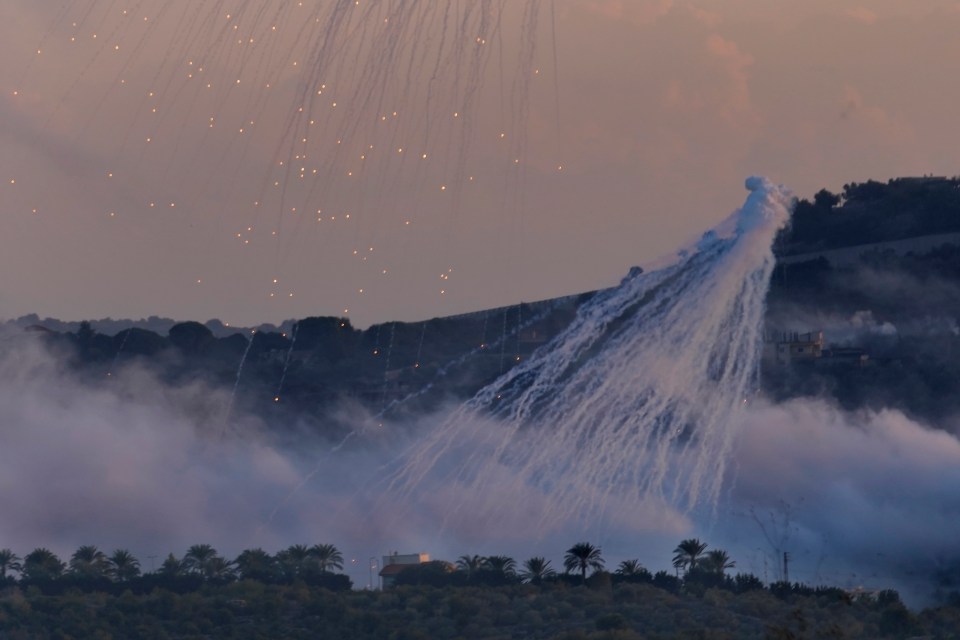 Shells from Israeli artillery explode over Dahaira, a Lebanese border village with Israel, south Lebanon on Monday after Hezbollah said its fighters targeted five Israeli posts along the border