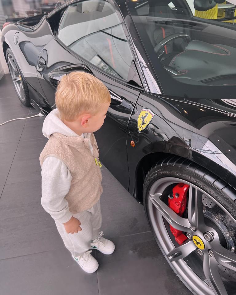 He took his son Brody to look at flash cars at the luxury garage