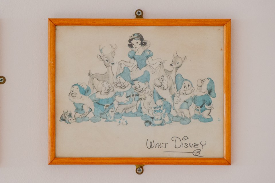 Walt donated a set of prints to the village in 1948, this one showing Snow White and the Seven Dwarves