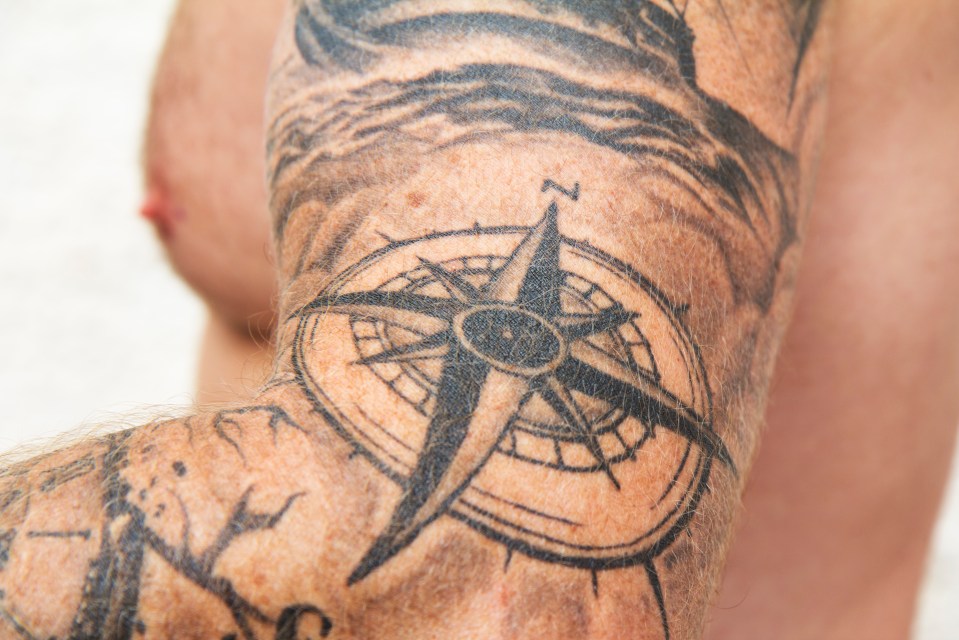 Mike explains that a client who requests a compass inking is usually 'fairly spiritual'