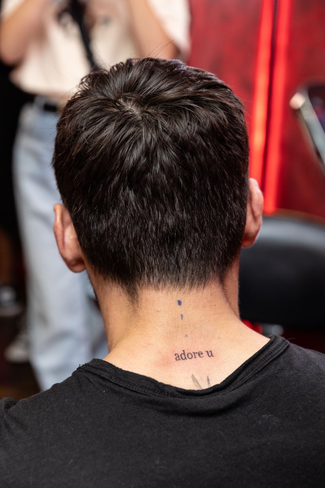 He had the words Adore u inked on the back of his neck