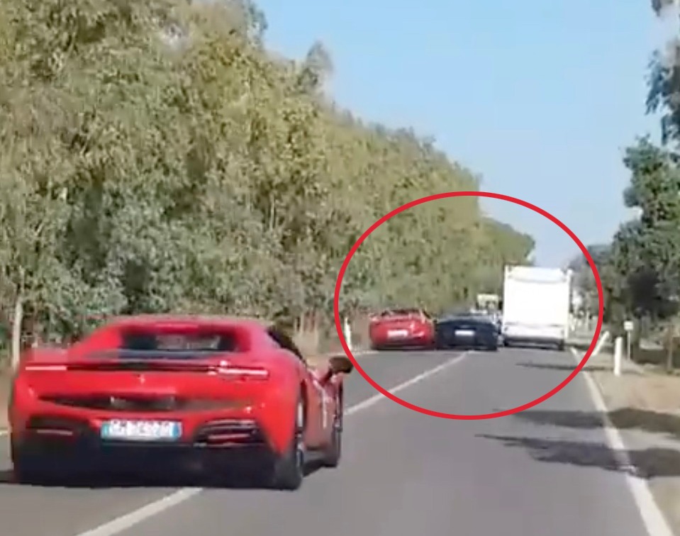 The two supercars clipped as they tried to overtake and crashed into the camper van