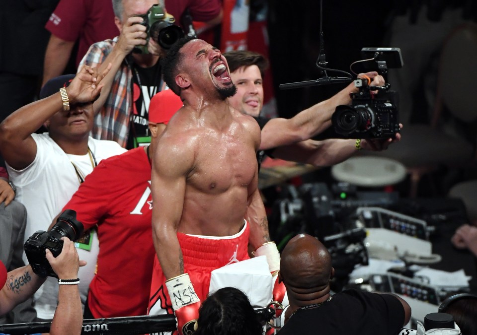 Andre Ward celebrates winning a world title in a second weight class