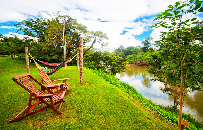 The lodge is located beside the Belize River