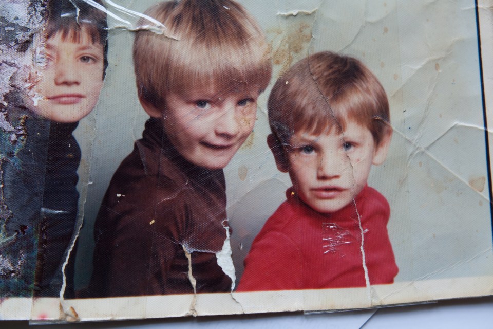 Sid with two of his brothers in a childhood snap