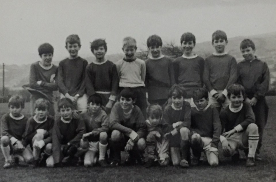 Sherman, bottom row second right, lines up with his Red Ravens team-mates