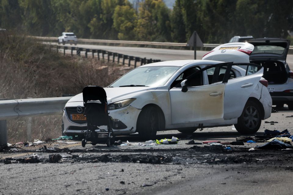 Cars and a stroller left behind following the assault