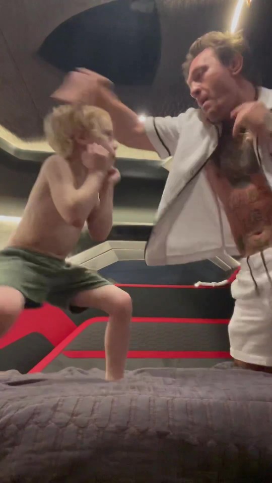 The Irishman was also seen teaching his son some fighting technique