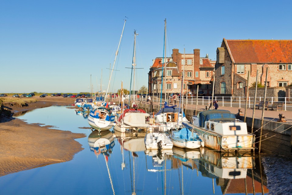 Villagers in Blakeney have voted overwhelmingly in favour of cracking down on tourists and second-home owners