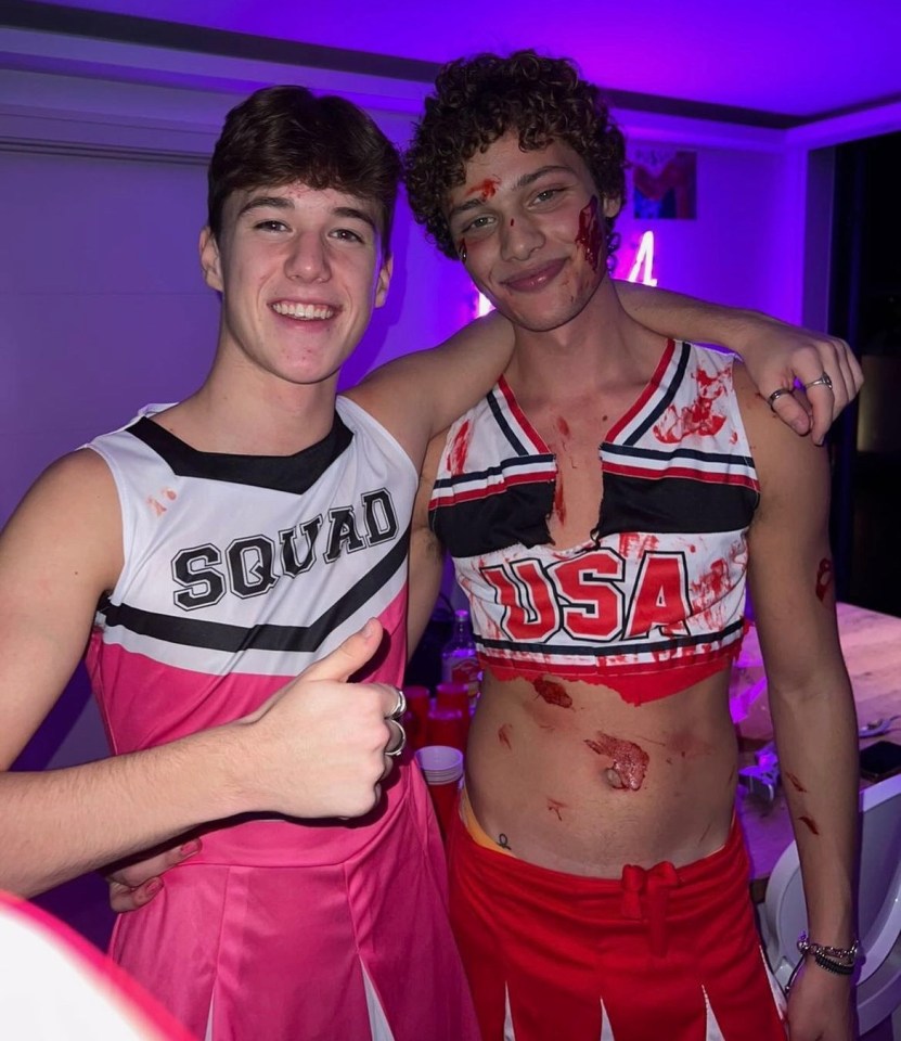 Bobby Brazier posed with a pal in a blood decorated cheerleader outfit