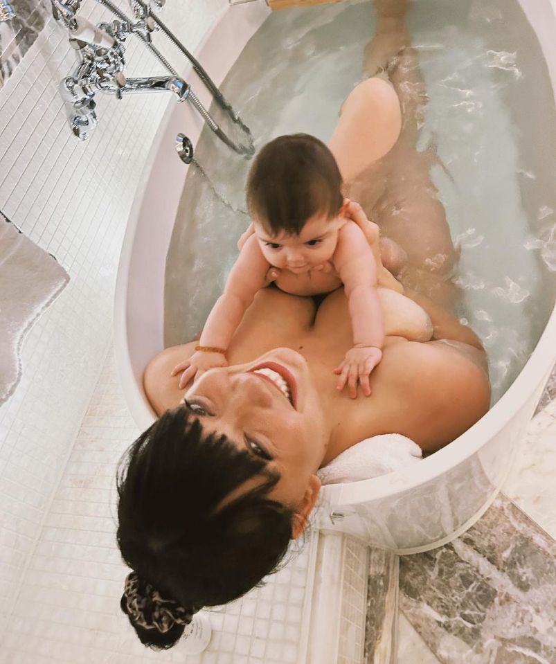 Daisy Lowe stripped naked for a bath selfie with her baby daughter Ivy