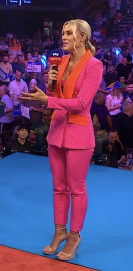 Gorgeous blonde Paton stole the show in a pink suit that showed off her cleavage