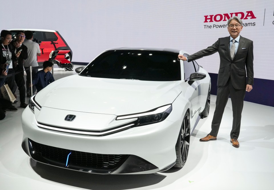 President and CEO of Japanese carmaker Honda  unveils the company’s hybrid Prelude