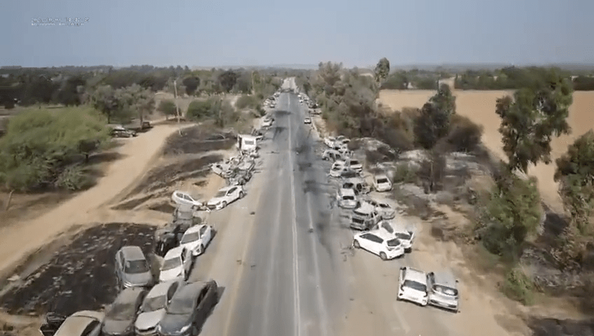 The road to the festival was left littered with abandoned cars and bodies after the Hamas ambush