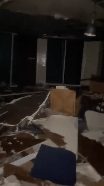 The flooded inside of a battered hotel in Acapulco