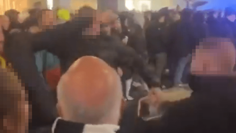 Football fans were seen brawling in footage shared online