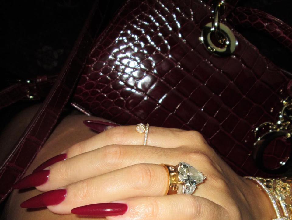 Another close up of her diamond rings then followed