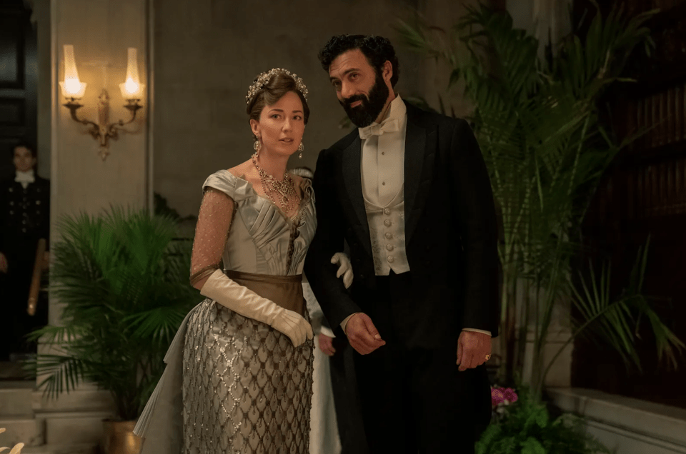 Carrie Coon and Morgan Spector reprise their roles as the wealthy Bertha and George Russell