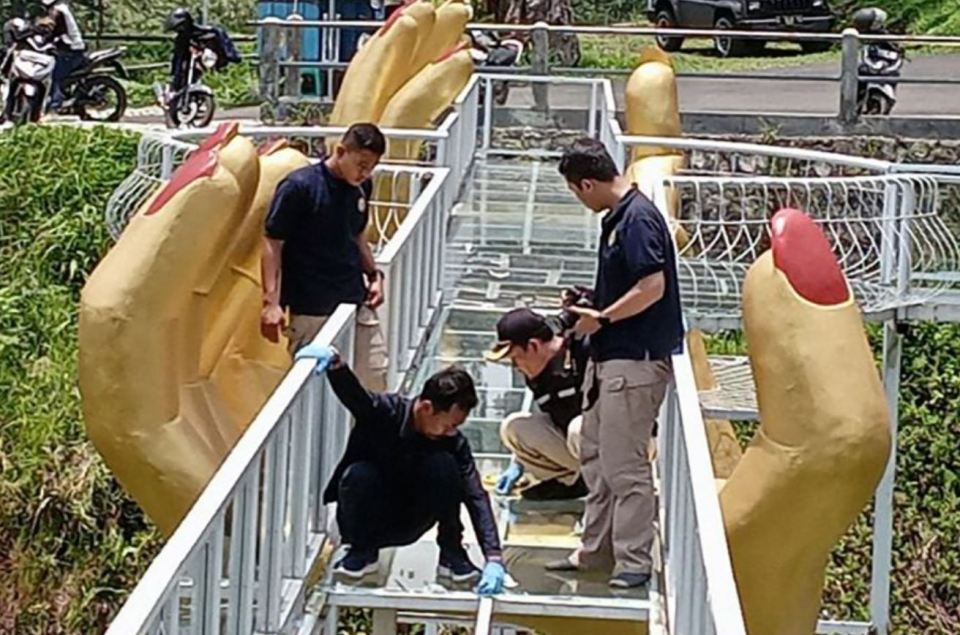 The bridge is inspected by investigators after the accident