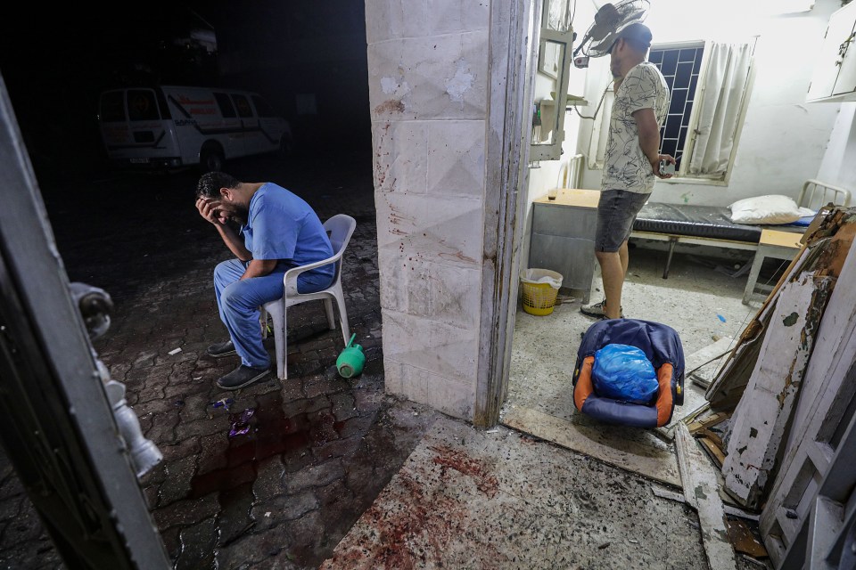 A doctor at the scene of Al-Ahli hospital after the deadly air strike in Gaza City