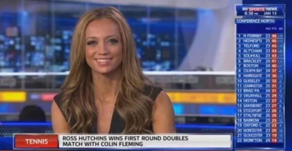 a woman stands in front of a screen that says ross hutchins wins first round doubles match with colin fleming