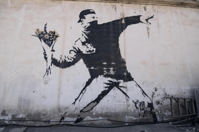 Banksy''s original 'flower thrower' artwork