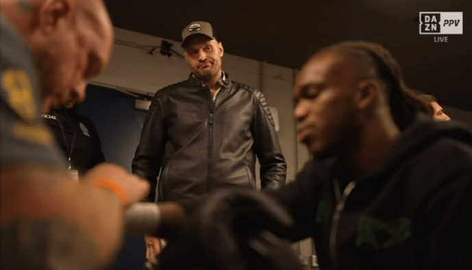 Tyson Fury overlooks KSI getting his hands wrapped - Credit: @DAZN