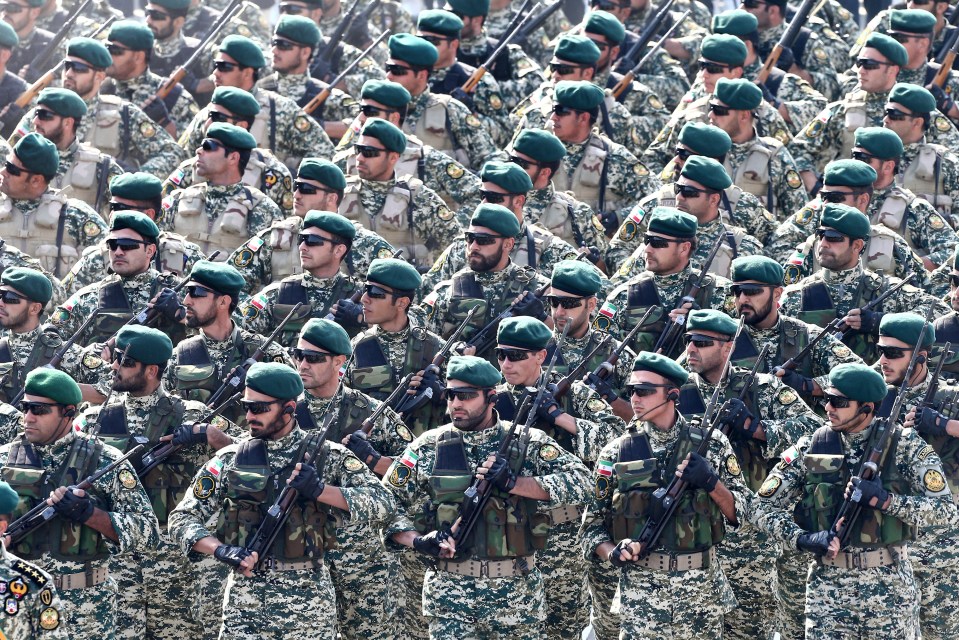 Iranian army troops march during a parade marking National Army Day