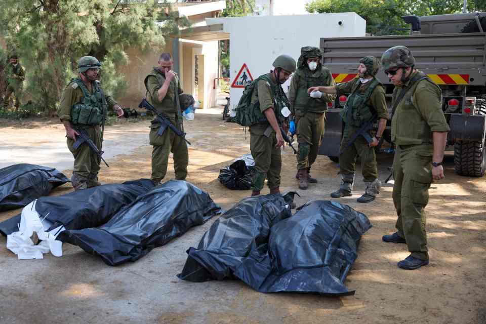 Entire families were gunned down by Hamas militants in Kfar Aza - a village close to the Gaza border