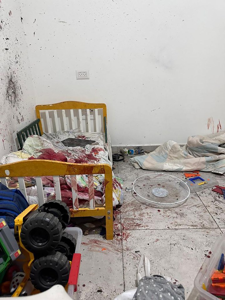 Israel’s PM has shared a harrowing image of a child’s blood-drenched bed after Hamas ‘beheaded babies’ in their brutal massacre of Kfar Aza