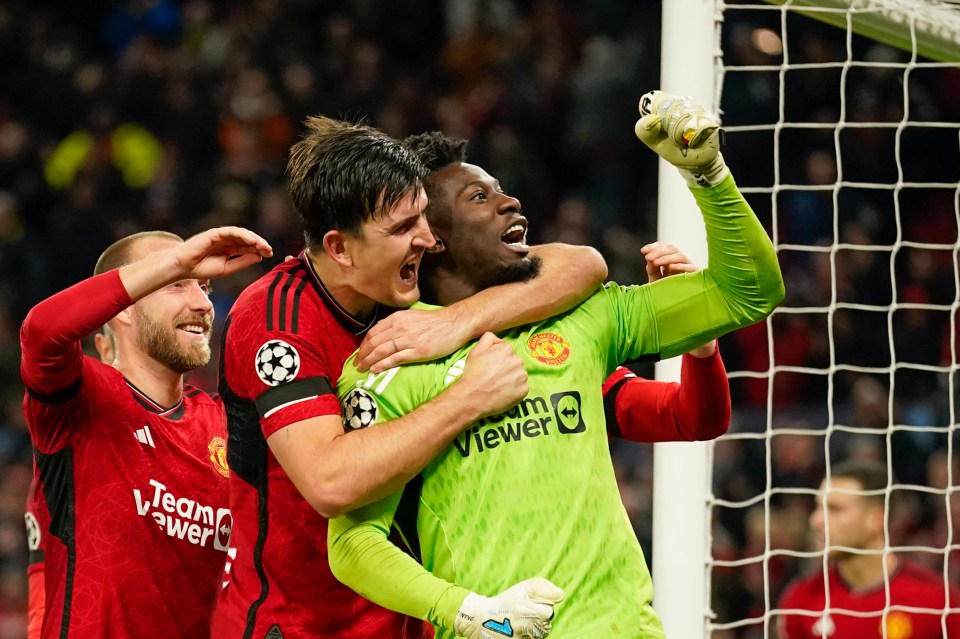 Onana, 27, is congratulated by Harry Maguire