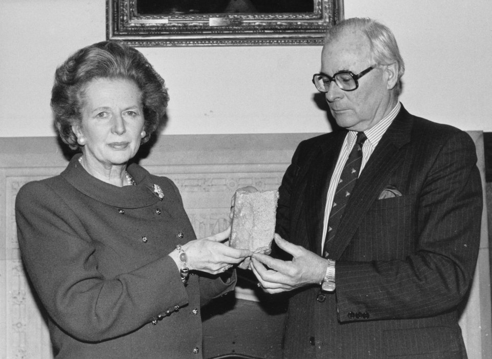 Margaret Thatcher receives a piece of the Berlin Wall