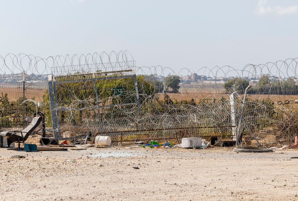 The smashed fence where the terrorist entered the kibbutz less than a mile from the Gaza border